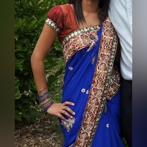 Elegant Blue and Red Embroidered Sari